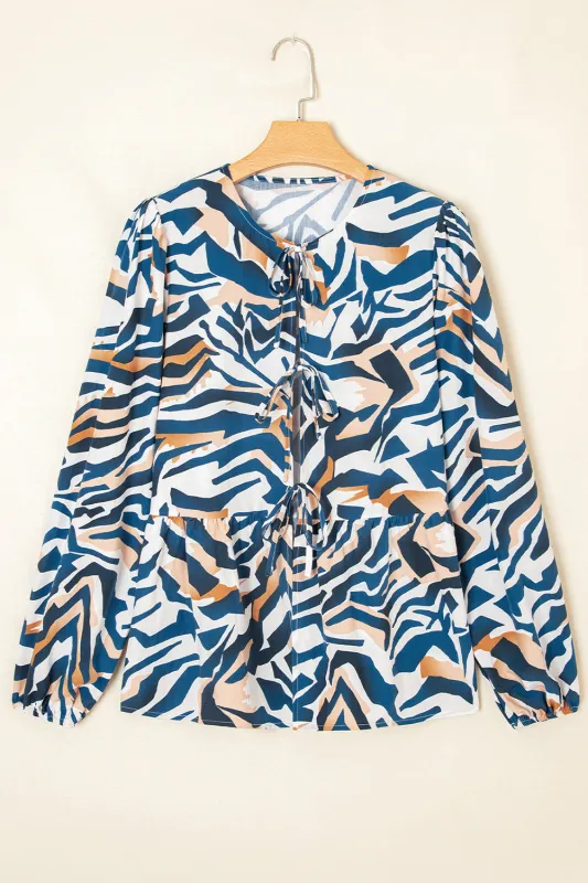 Zebra Print Tied Front Puff Sleeve Top sold by eAura