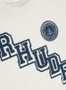RHUDE COLLEGIATE CREST TEE sold by Rhude