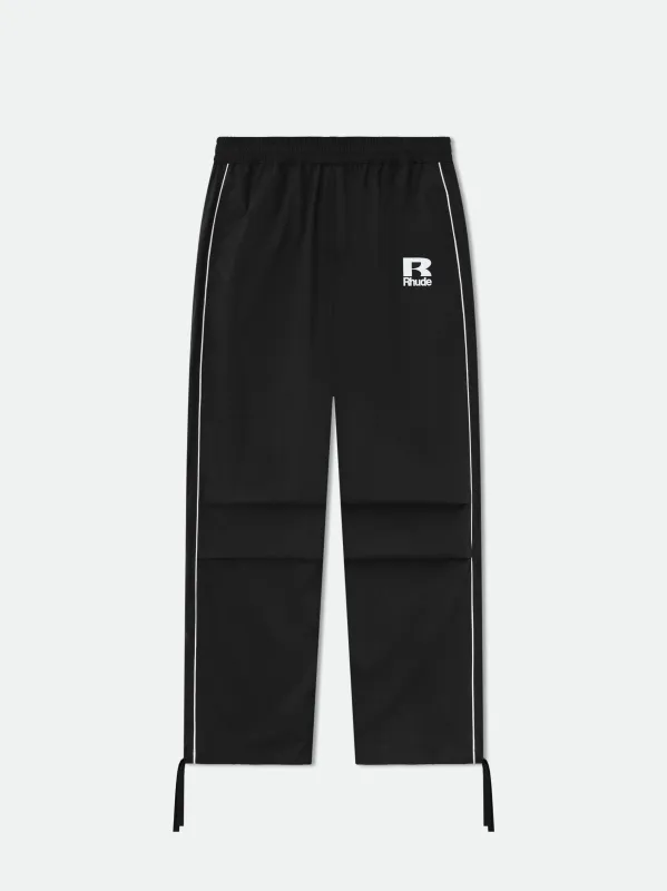 RHUDE PIPING PARACHUTE TRACK PANT sold by Rhude
