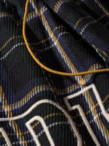 FLANNEL COURT LOGO SHORTS sold by Rhude