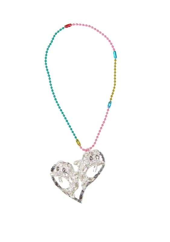 SILVER JET DOLPHIN HEART NECKLACE sold by Collina Strada