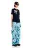 BLACK FLOWER DRIP TOSH TEE sold by Collina Strada