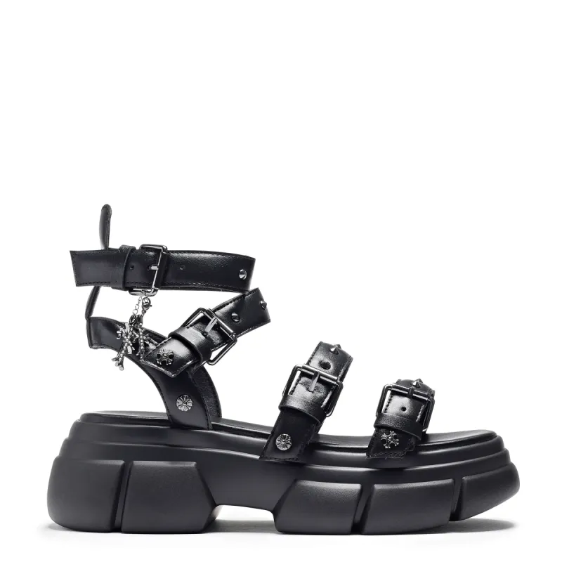 A Raining Vengeance Charm Platform Sandals sold by Shoe Freaks