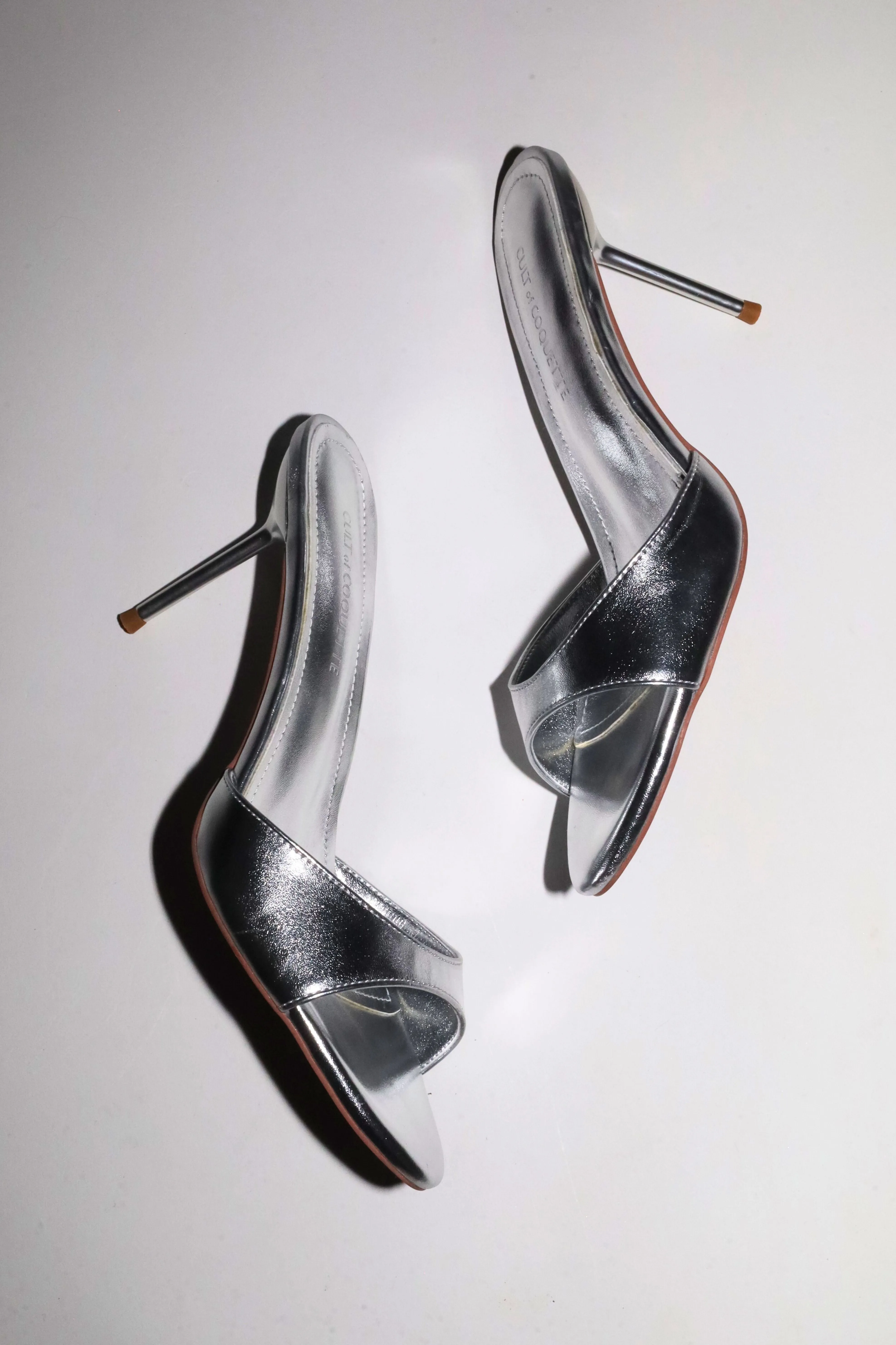 Pia Silver Mules 80 mm sold by Cult of Coquette