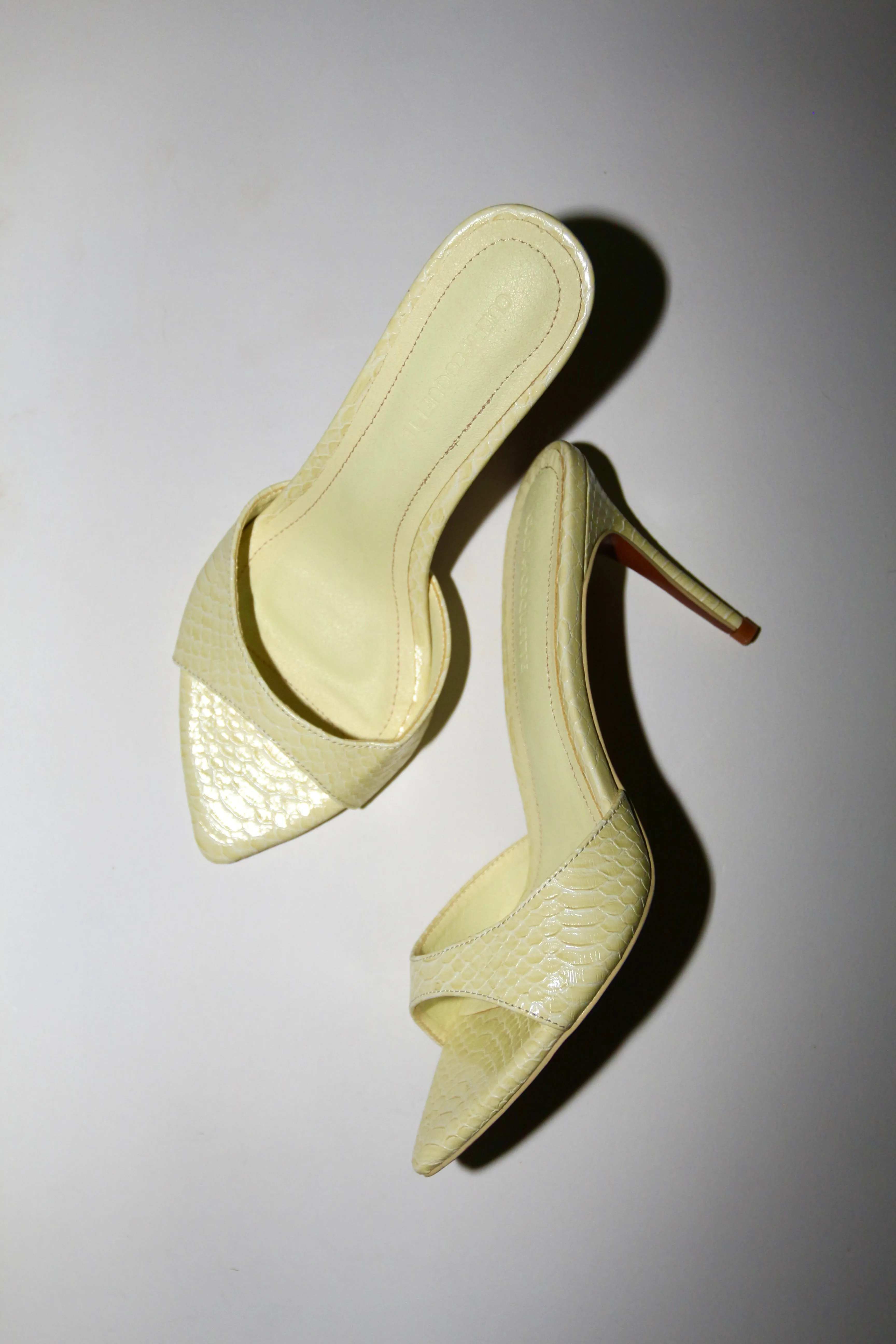 Gia Butter Yellow Reptile Vegan Mules 80 mm sold by Cult of Coquette