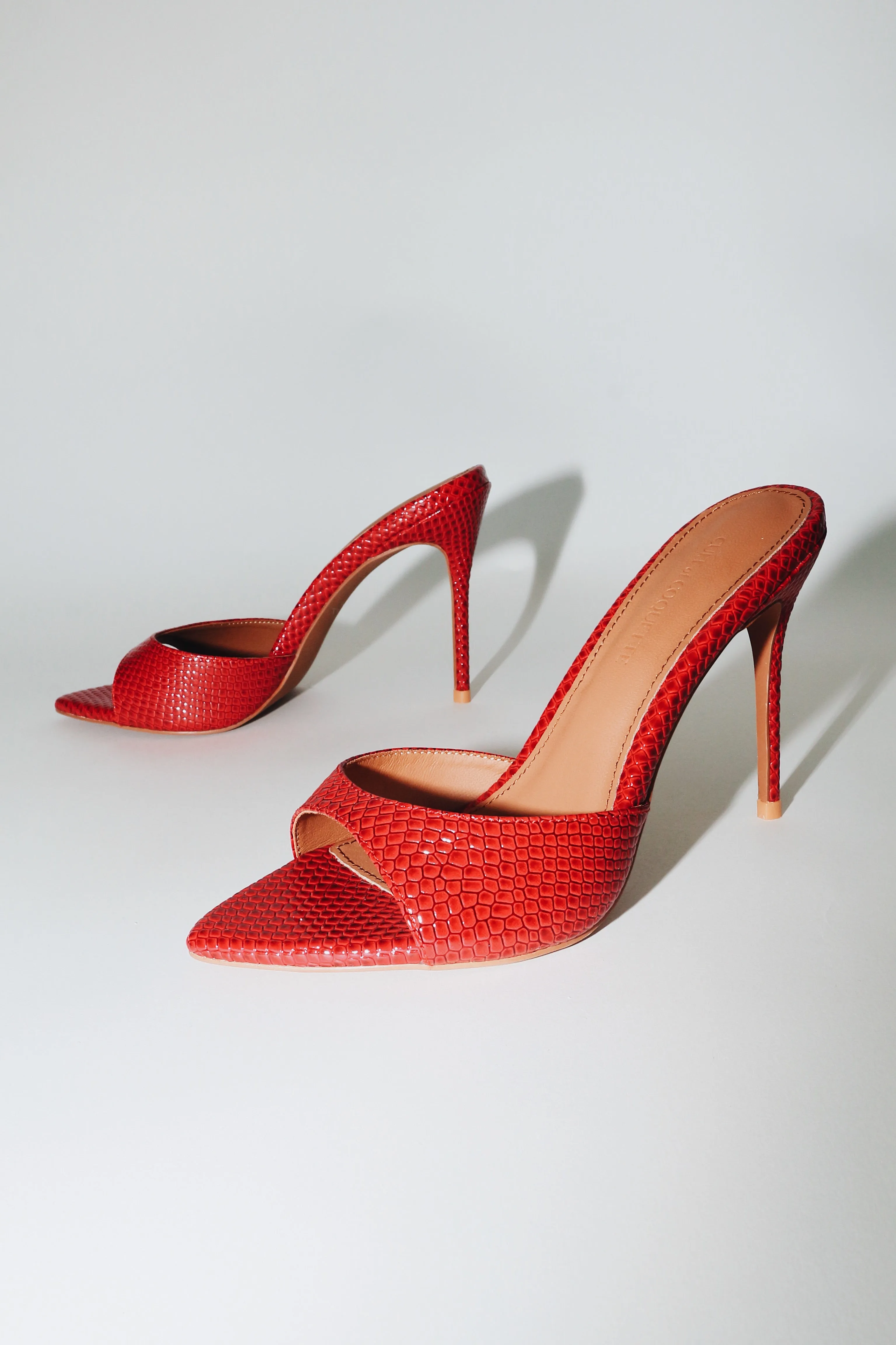 Gia Red Reptile Vegan Mules 100 mm sold by Cult of Coquette