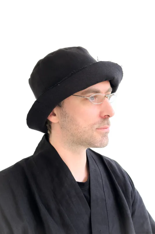 Layered black bucket hat sold by MDNT:45