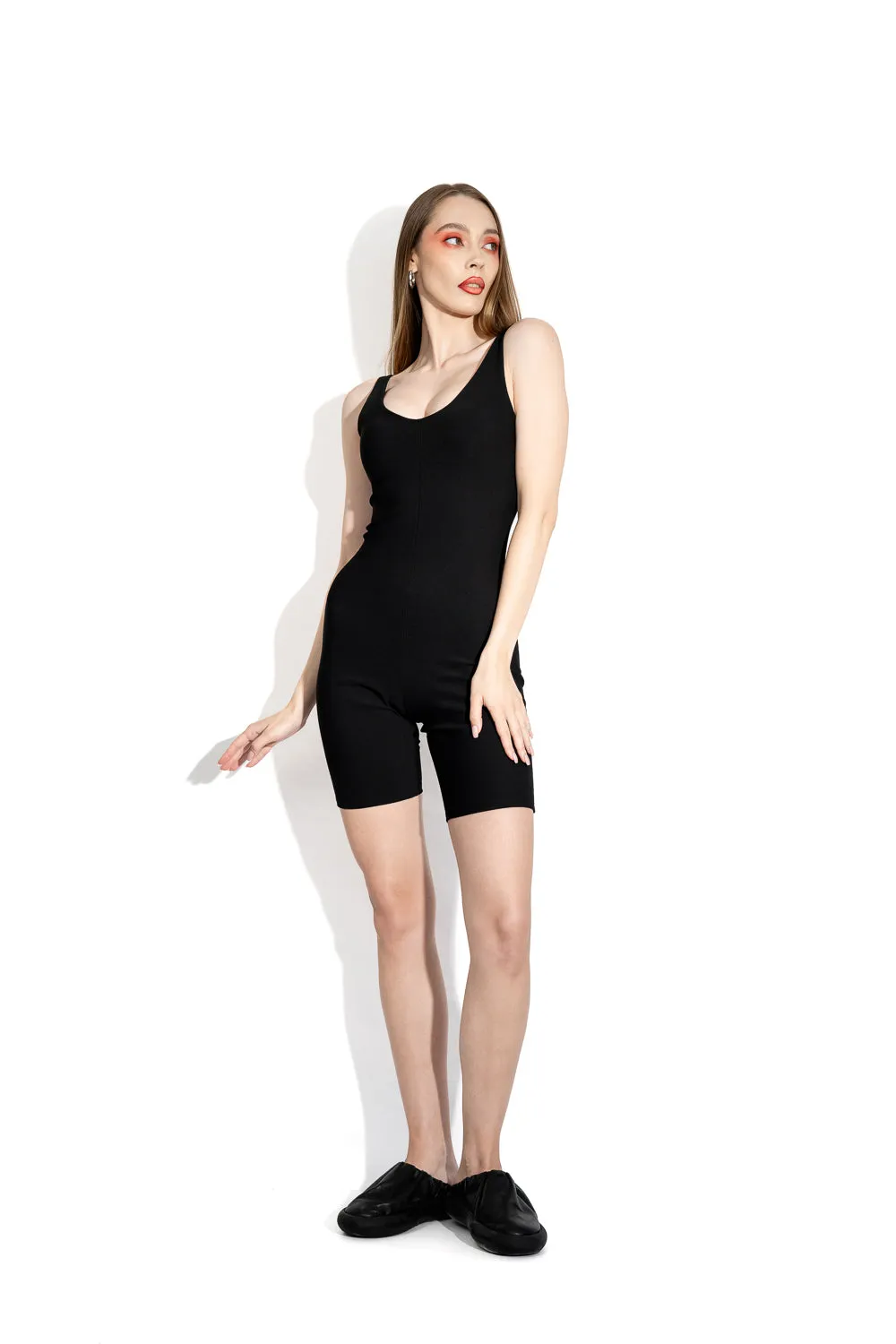 Black mid scoop-back bodysuit sold by MDNT:45