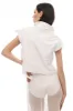 White cropped jacket sold by MDNT:45