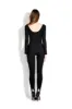 Black long stirrup bodysuit sold by MDNT:45