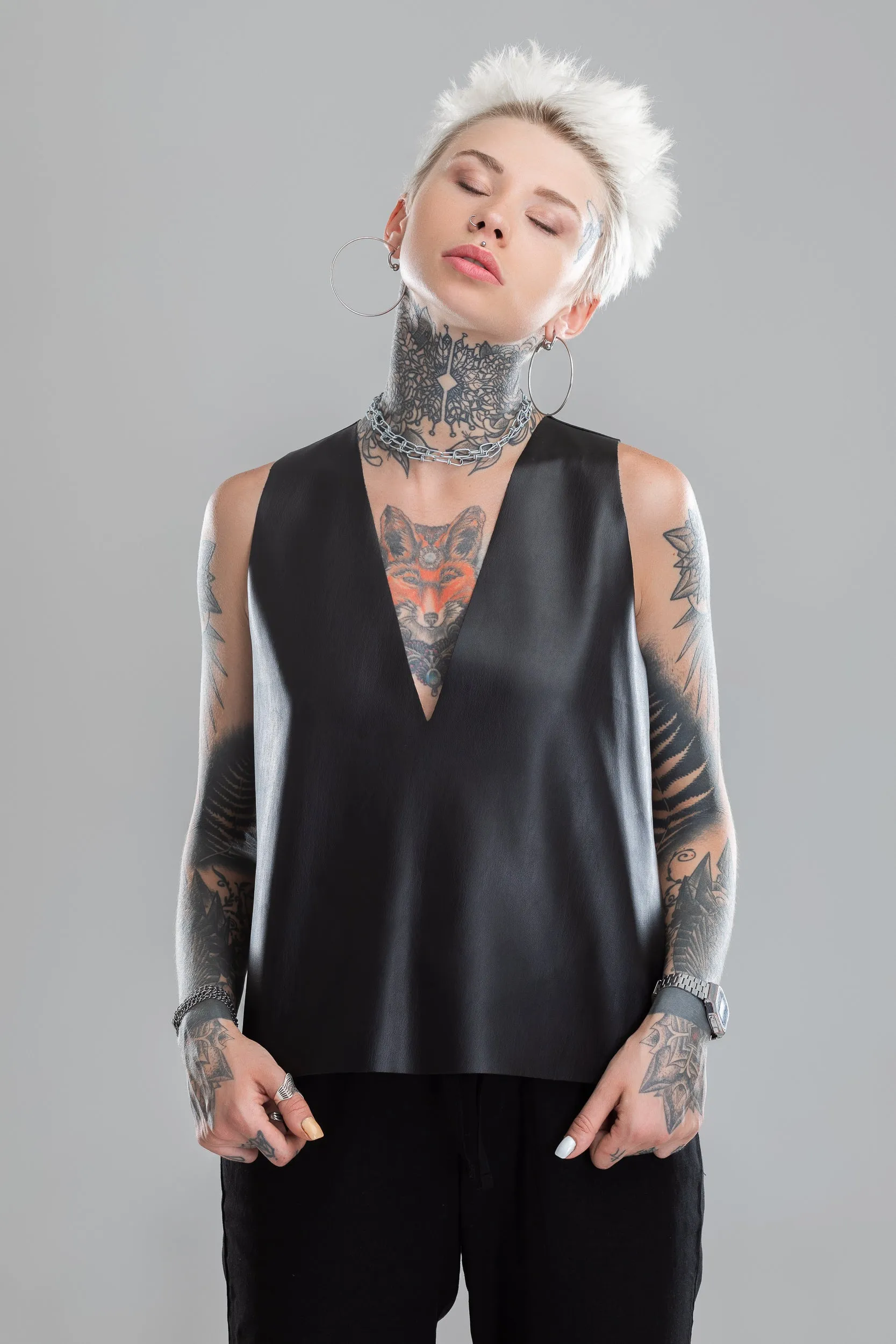 Faux leather flowy top sold by MDNT:45