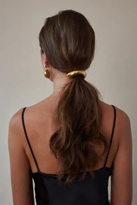 Glossy Arch Pony Cuff sold by Jones