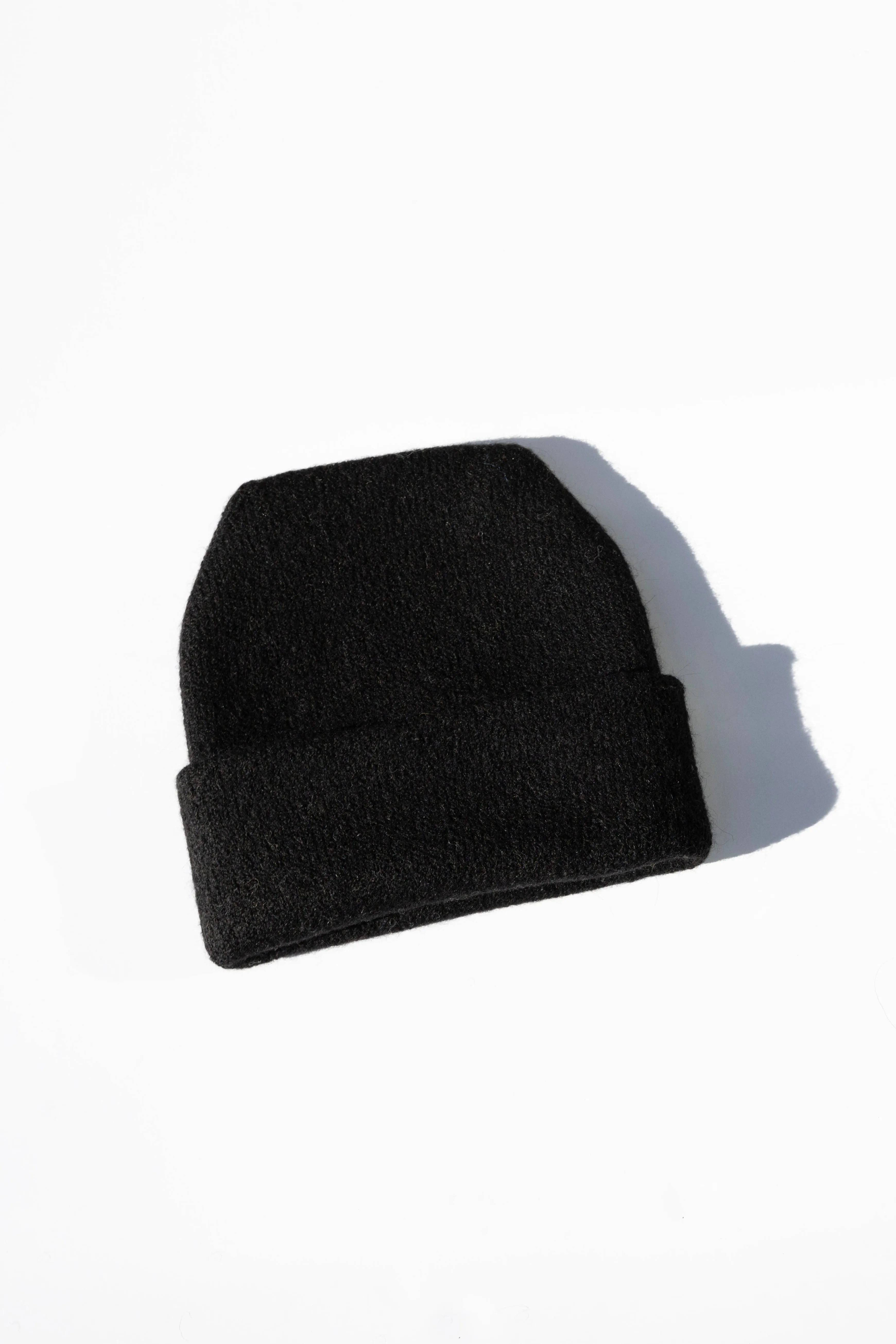 Parker Oversized Beanie in Black sold by Jones
