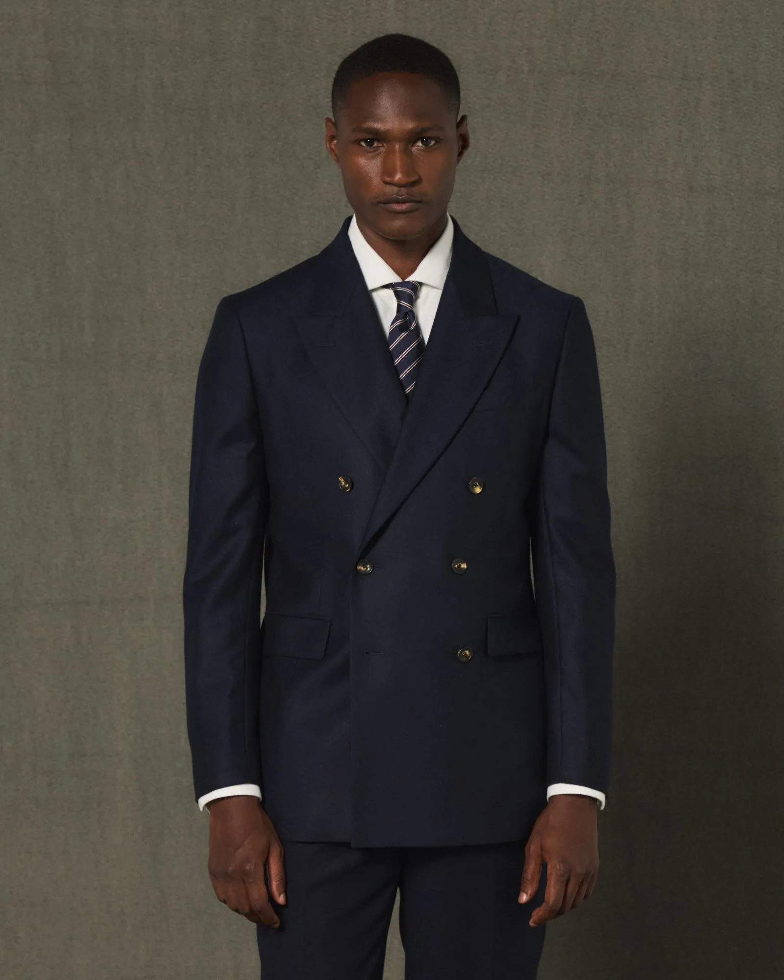 Veste croisée en flanelle de laine marine sold by Hast Paris