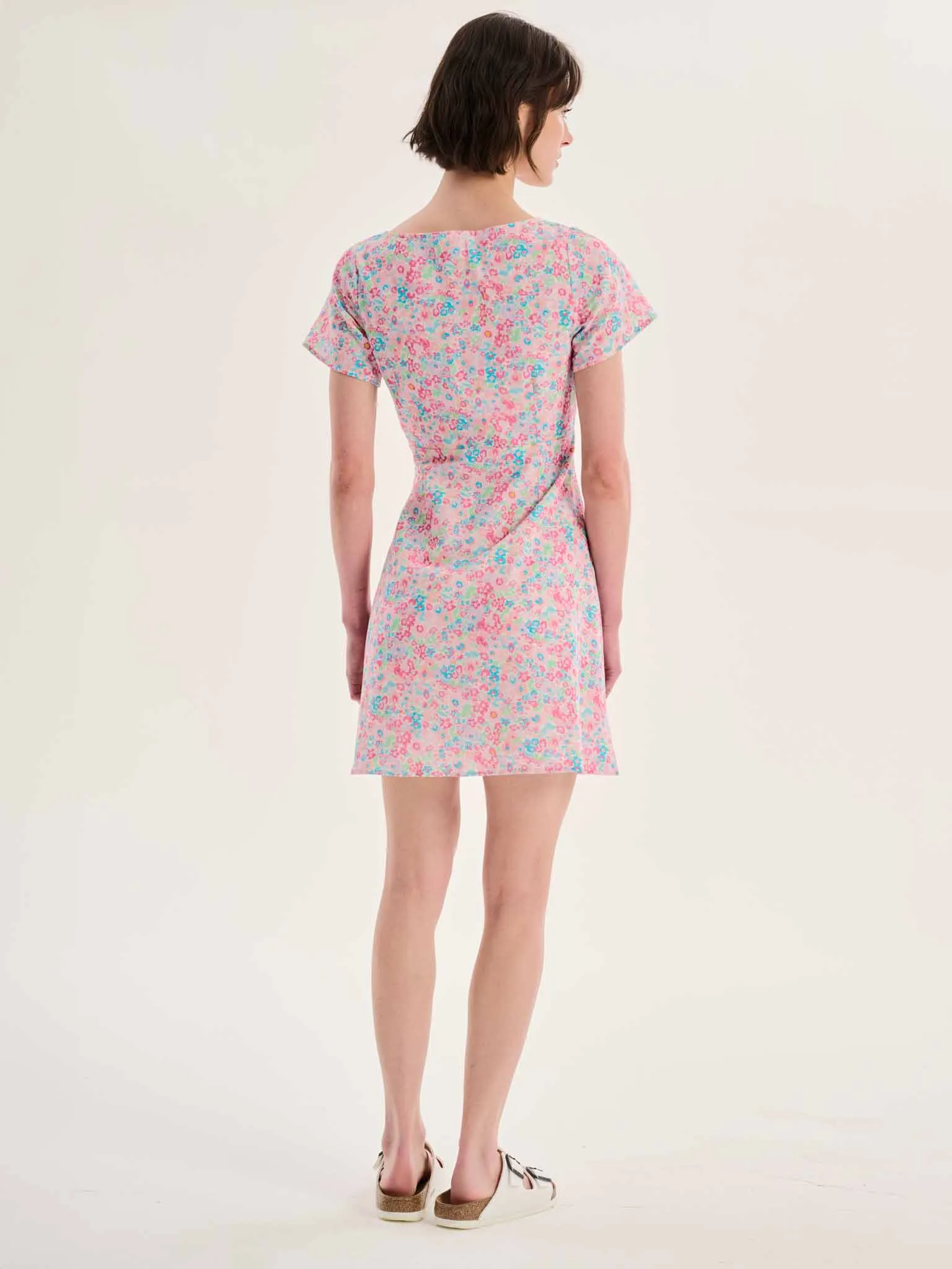 Dotty V Neck Ruched Mini Dress in Floral Print sold by Omnes product image thumbnail 5