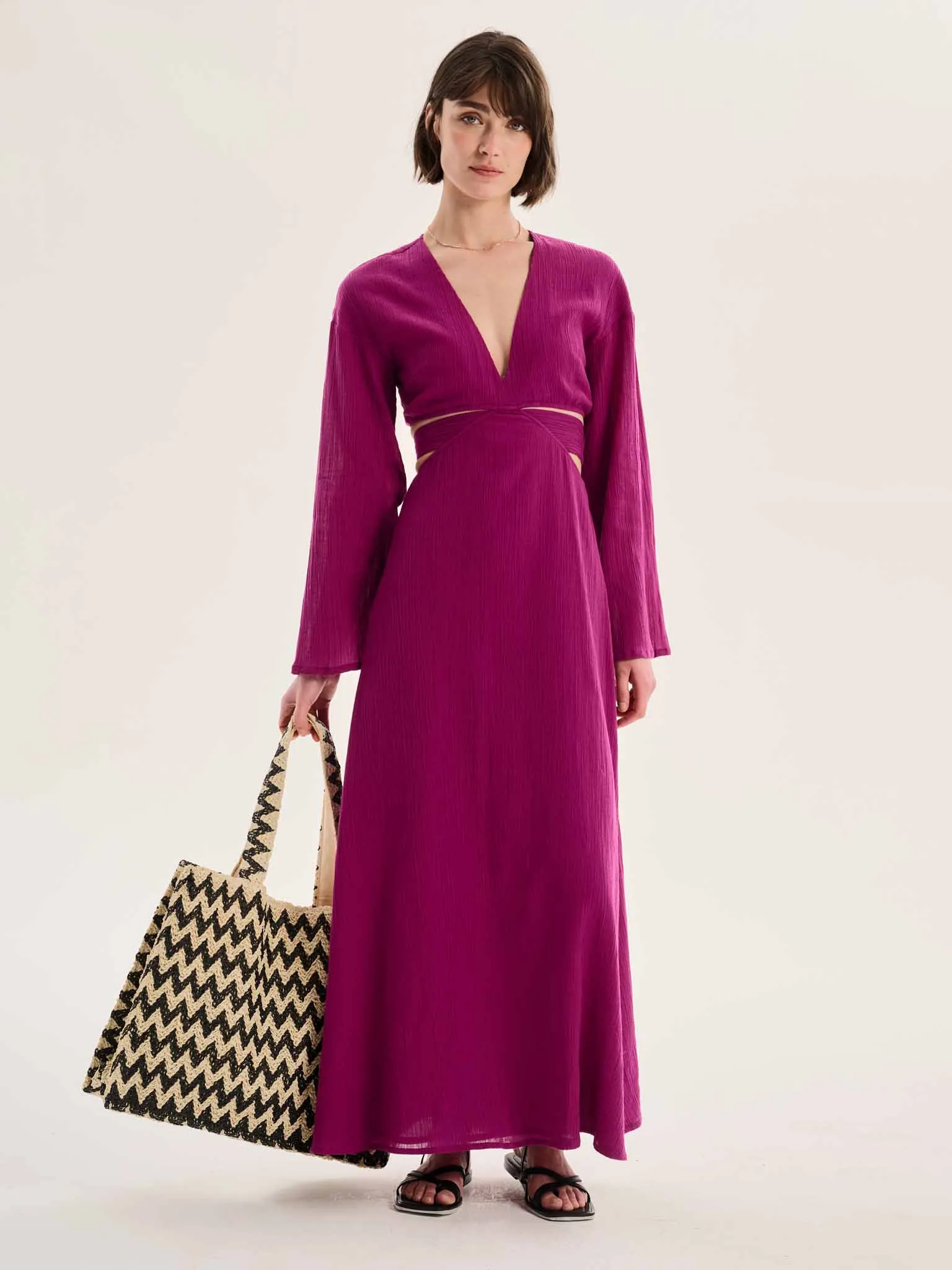 Orla Cut Out Maxi Dress in Purple sold by Omnes