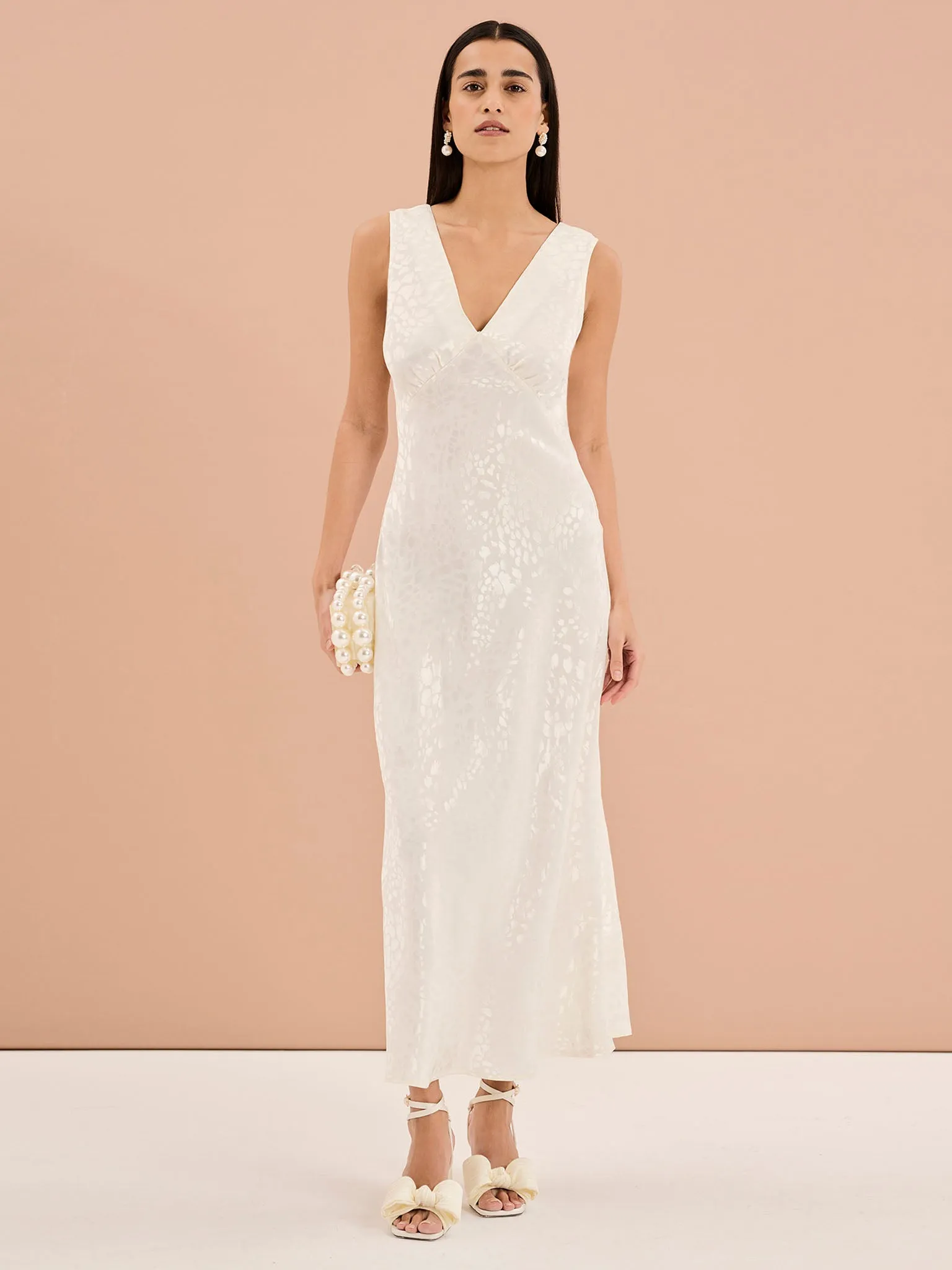 Iris Maxi Dress in Ivory sold by Omnes