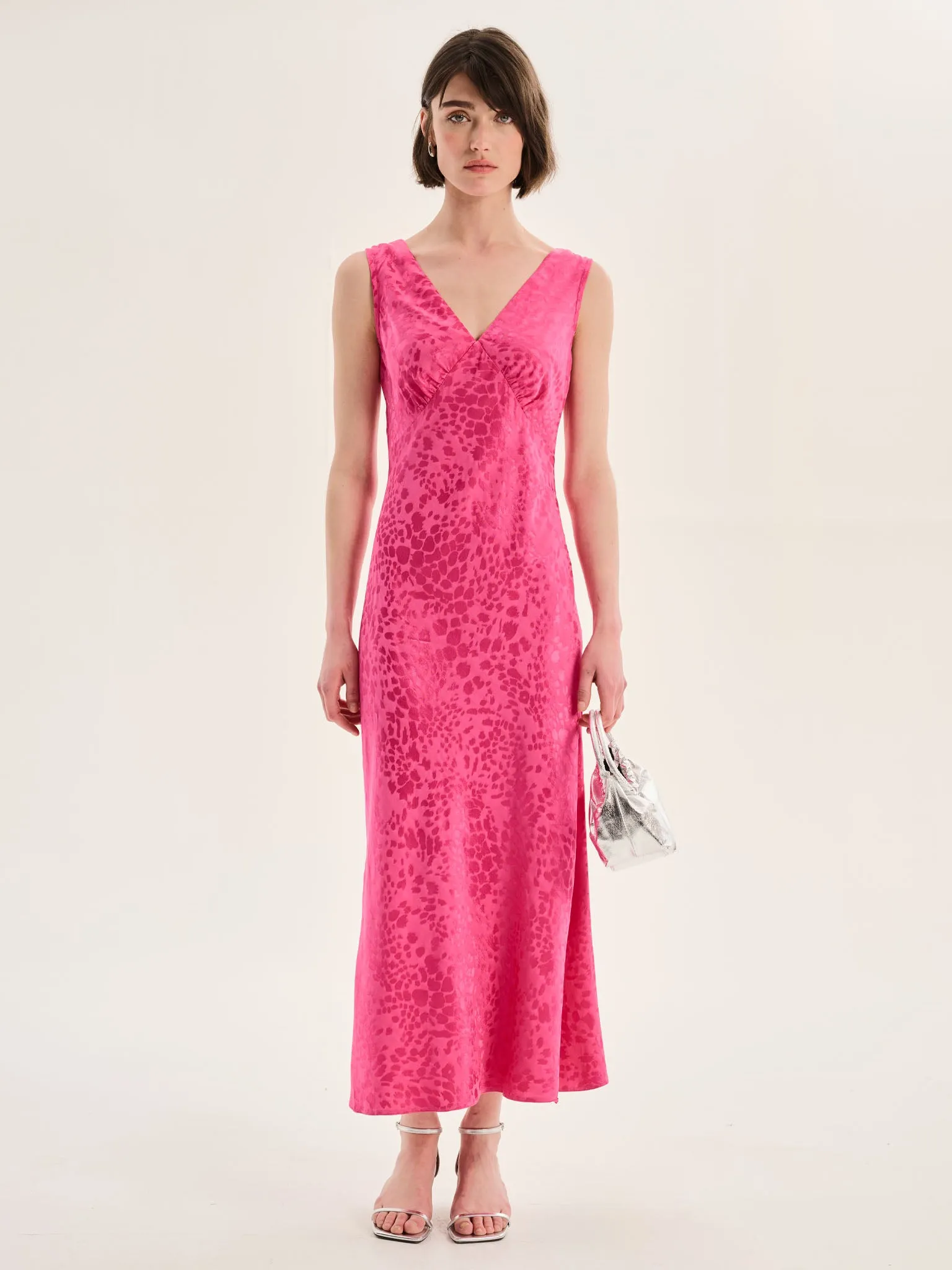 Iris Maxi Dress in Cerise Pink sold by Omnes