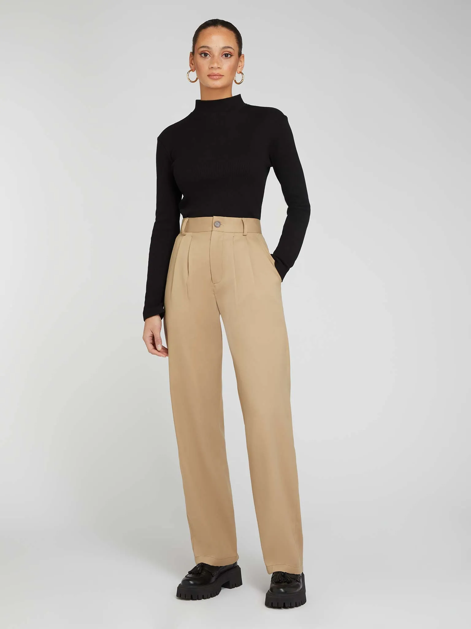 Cinnamon Relaxed Trousers in Beige sold by Omnes