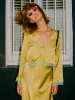 Ambretta Top in Gold with Blue Trim sold by Omnes