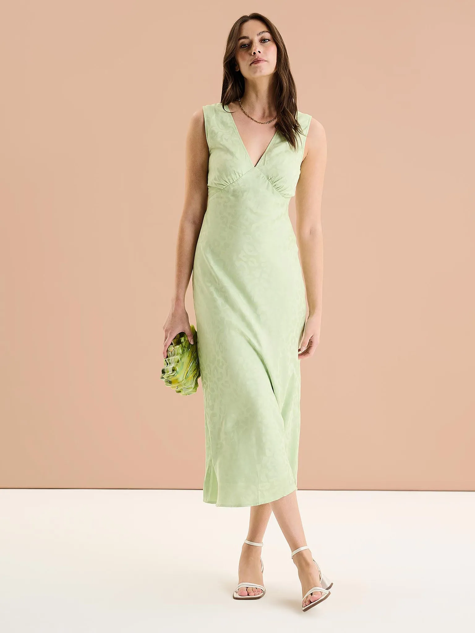 Iris Maxi Dress in Pistachio Green sold by Omnes