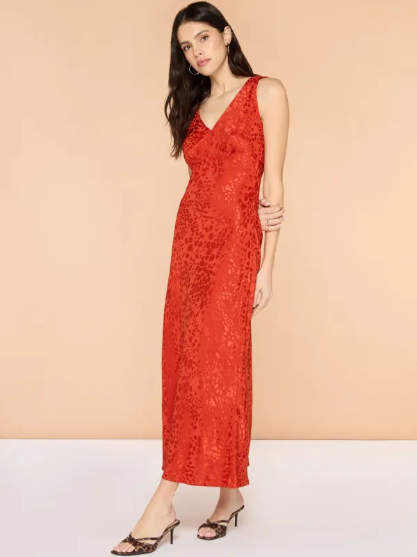 Iris Maxi Dress in Brick Orange sold by Omnes