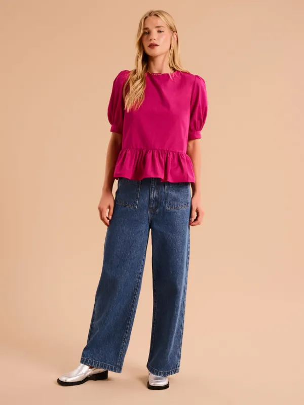 Ellie Frill Hem Puff Sleeve Cotton Blouse in Magenta sold by Omnes