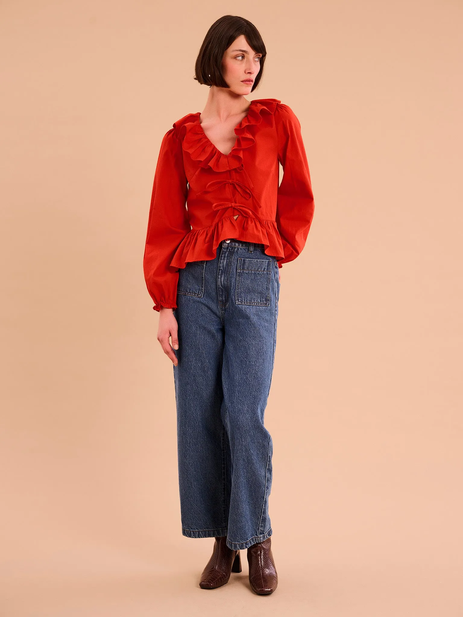 Selena Frill Blouse in Red sold by Omnes