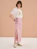 Madelyn Midi Skirt in Pink Check Print sold by Omnes