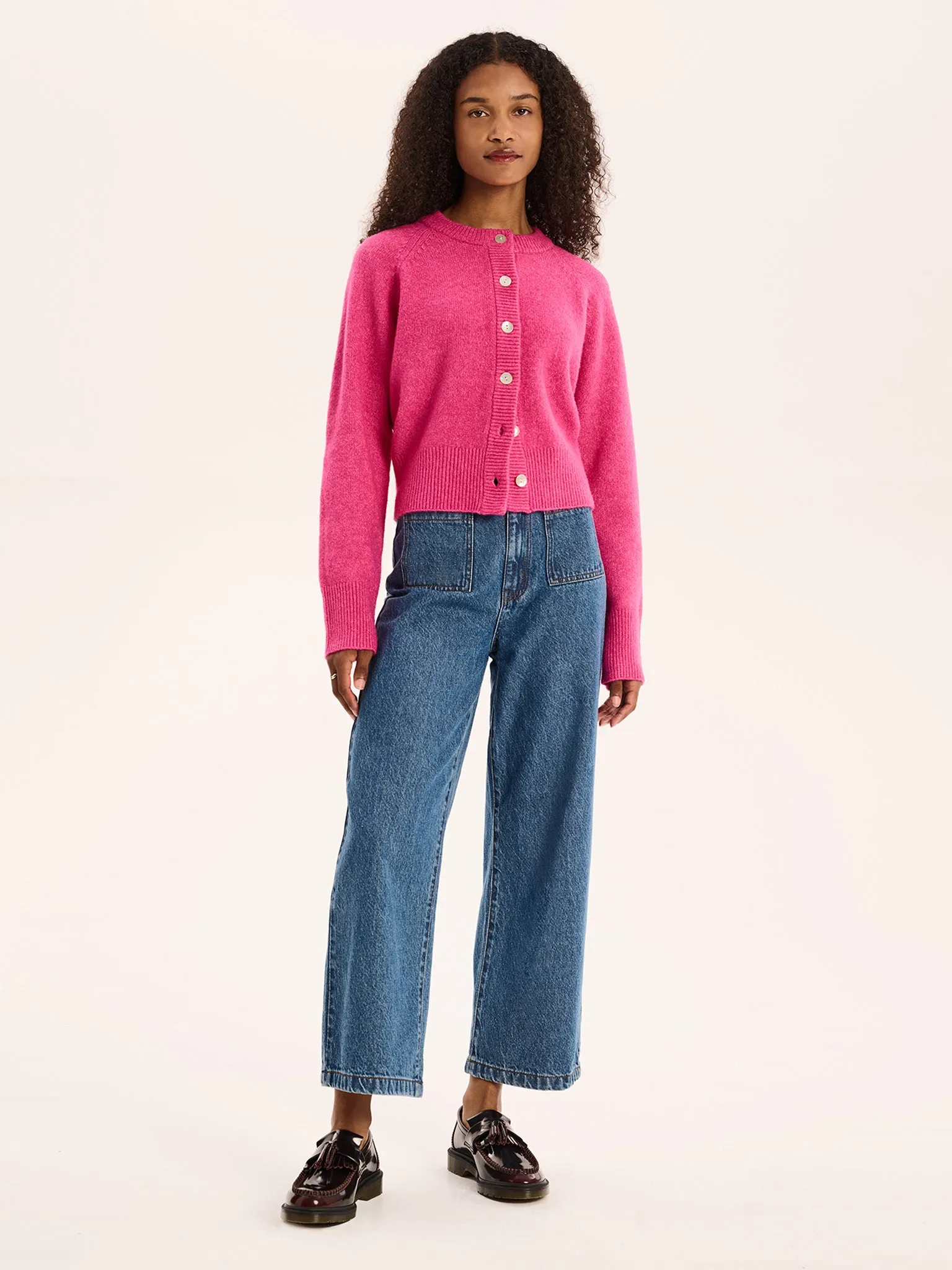 August Fluffy Cardigan in Magenta sold by Omnes