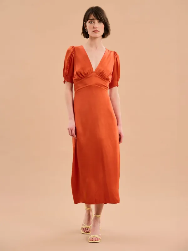 Odette Dress in Burnt Orange sold by Omnes