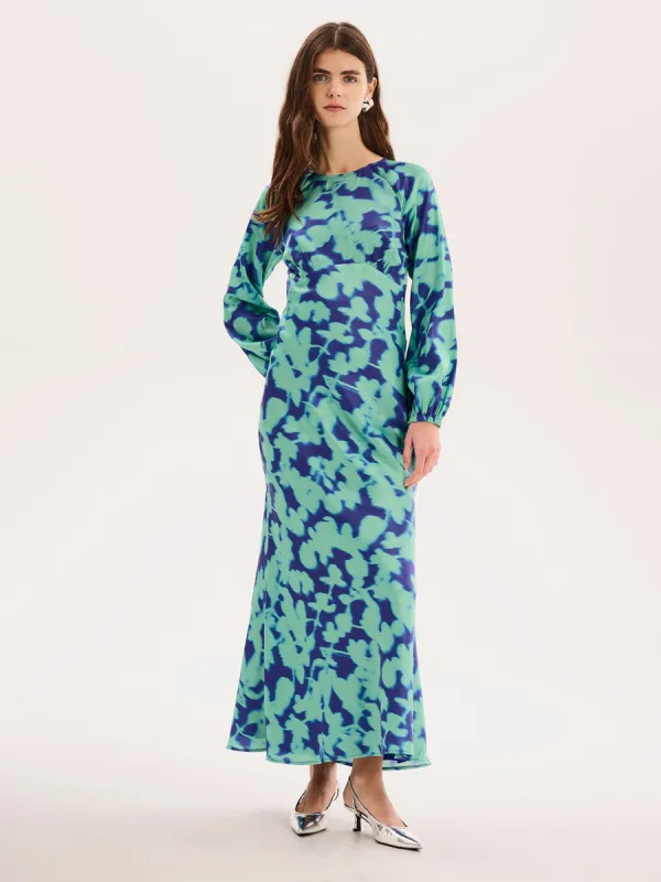 Joelle Dress in Blurred Floral sold by Omnes