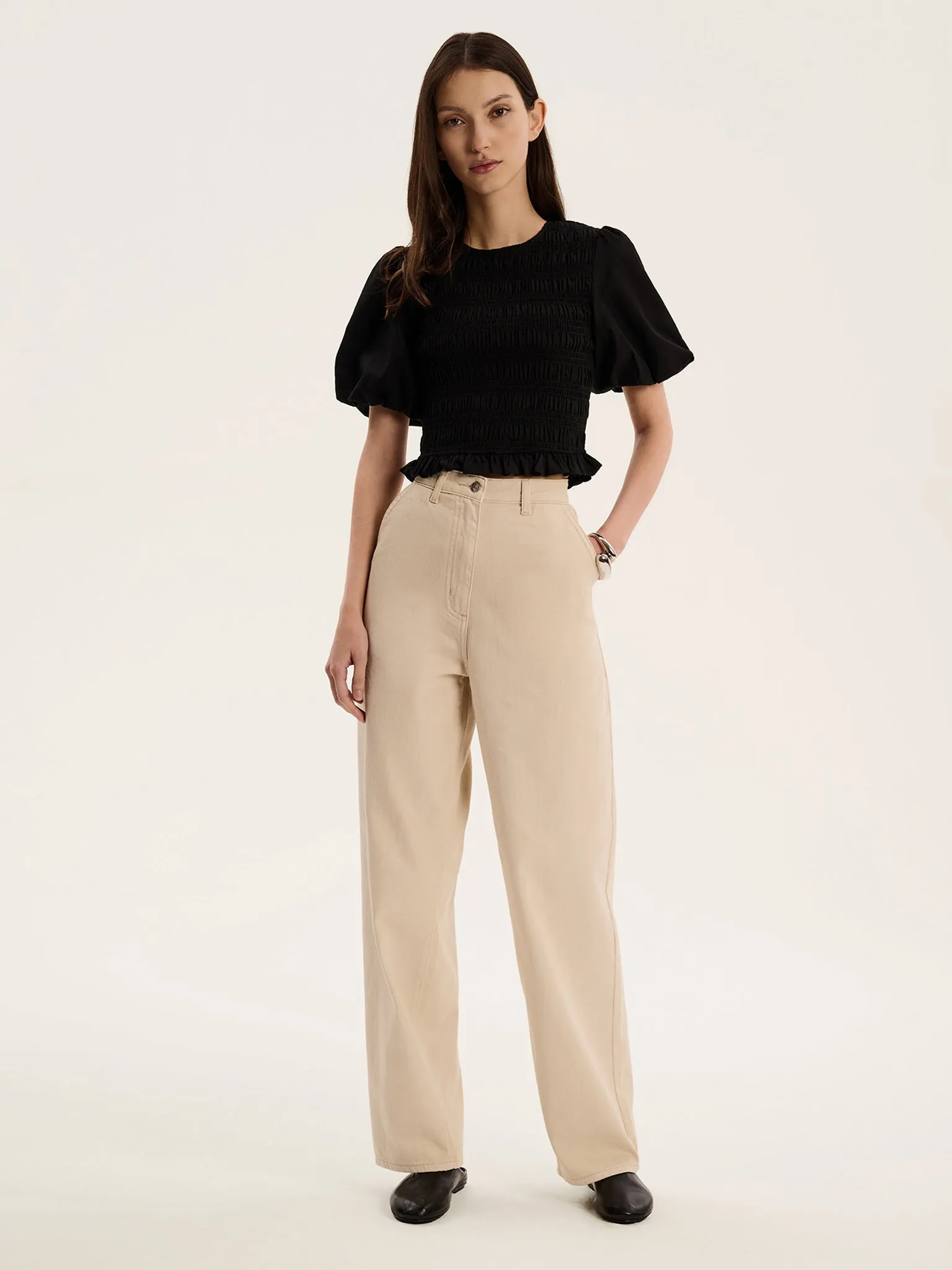 Nicolla Top in Black sold by Omnes