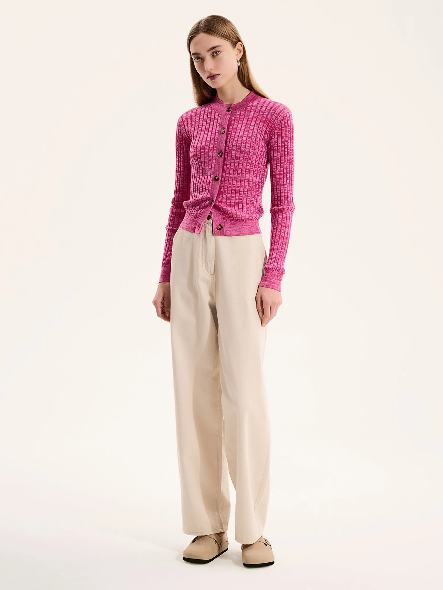 Daisy Cardigan in Space Dye Pink sold by Omnes