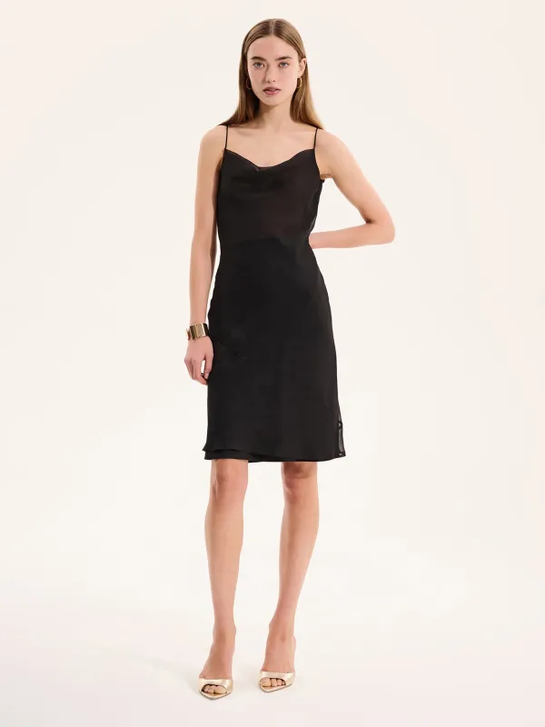 Kiki Mini Dress in Black sold by Omnes