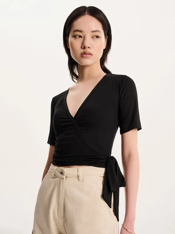 Venus Wrap Top in Black sold by Omnes