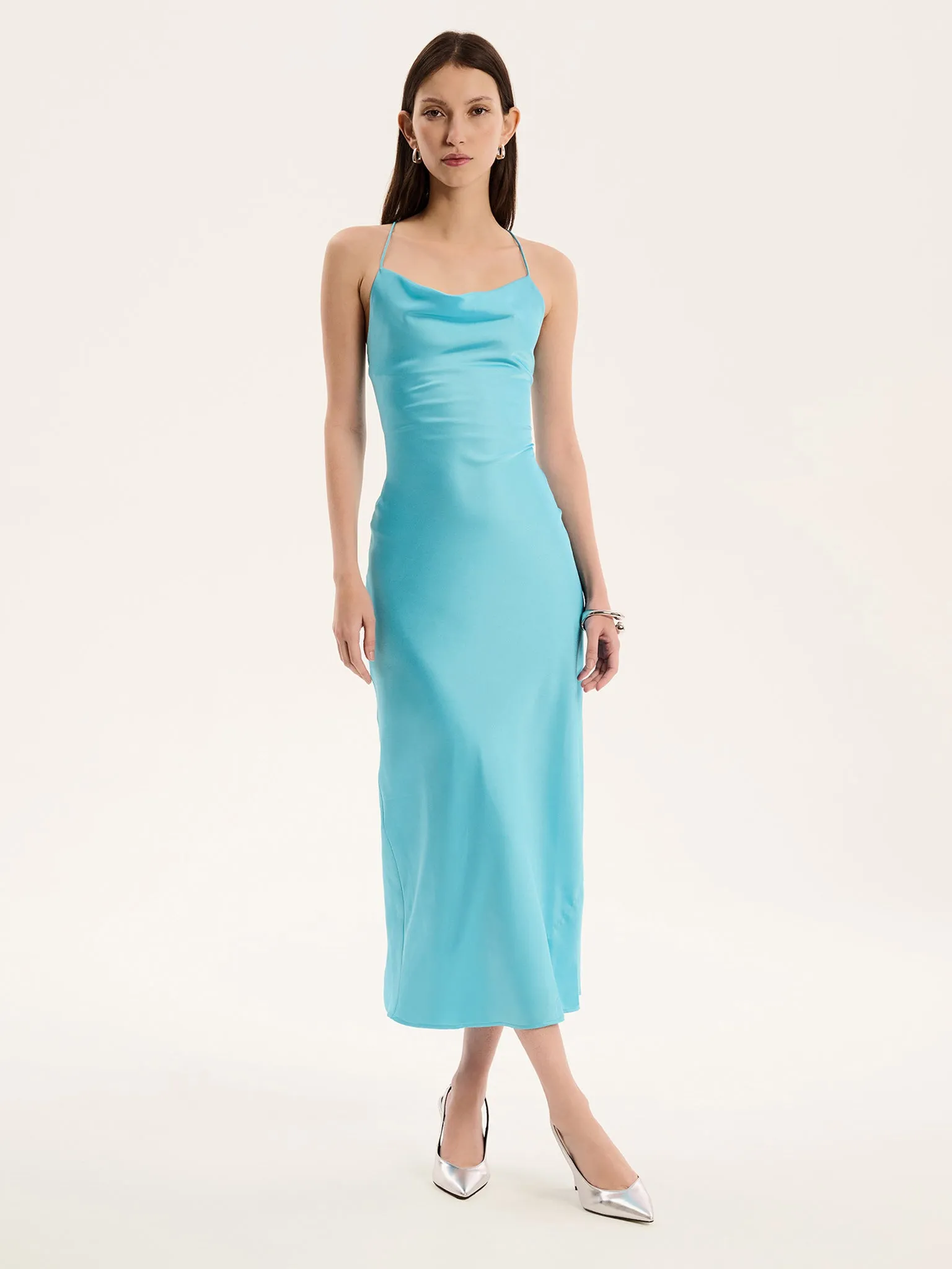 Riviera Midi Dress in Turquoise sold by Omnes