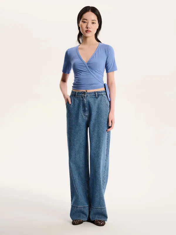 Venus Wrap Top in Blue sold by Omnes