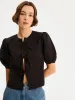Apollo Blouse in Black sold by Omnes