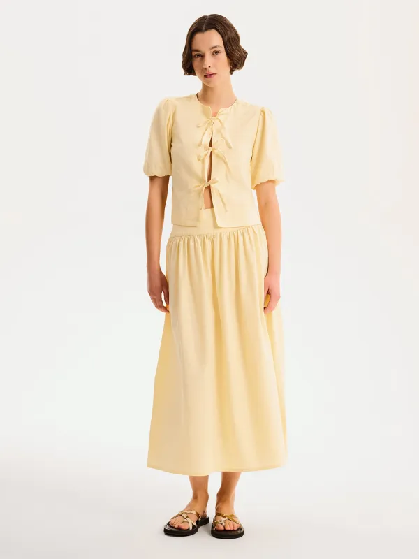 Darcie Skirt in Butter Yellow sold by Omnes