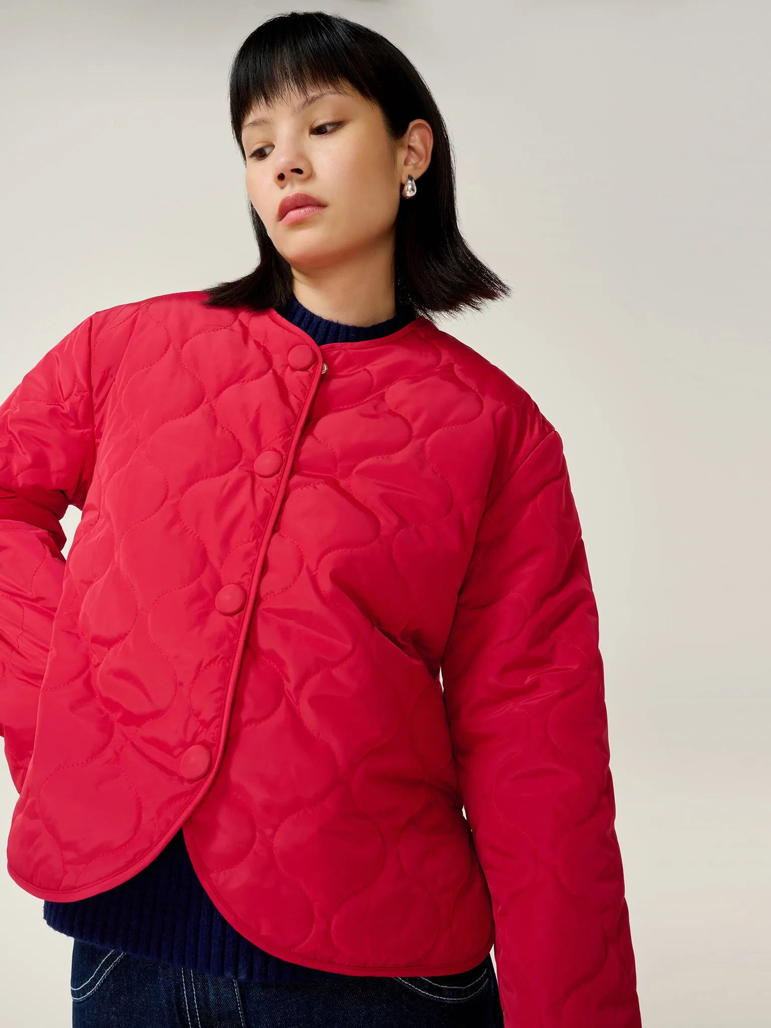 Addie Puffer in Red sold by Omnes