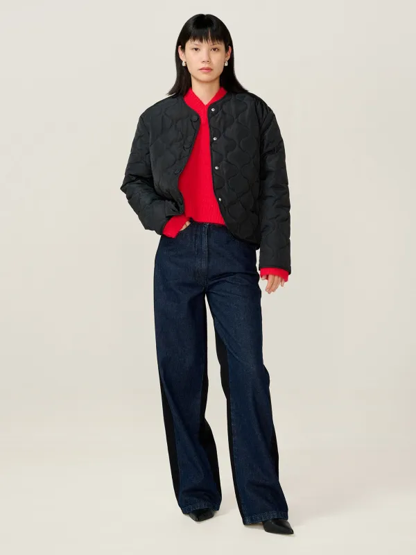 Addie Puffer in Black sold by Omnes