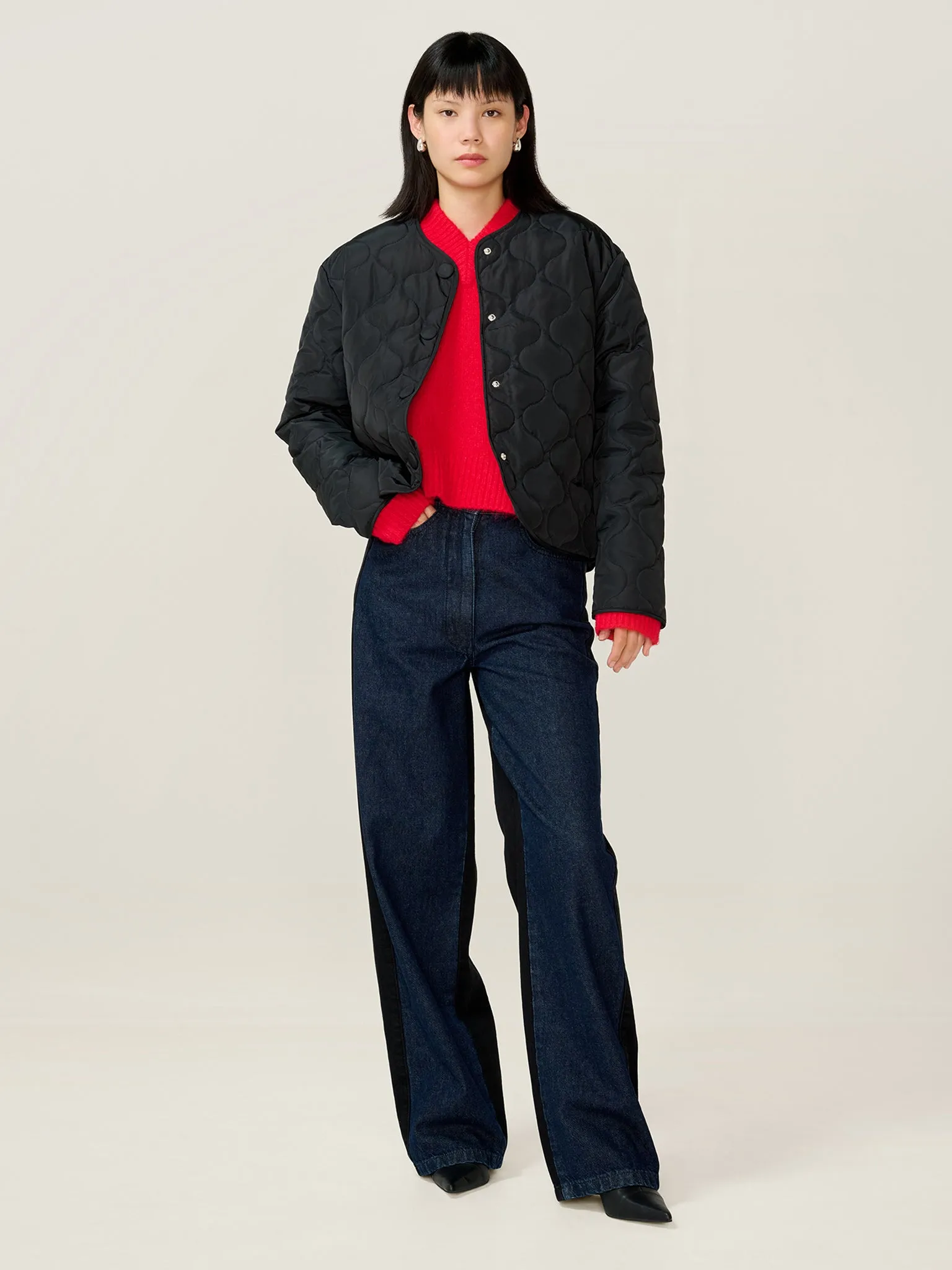 Addie Puffer in Black sold by Omnes