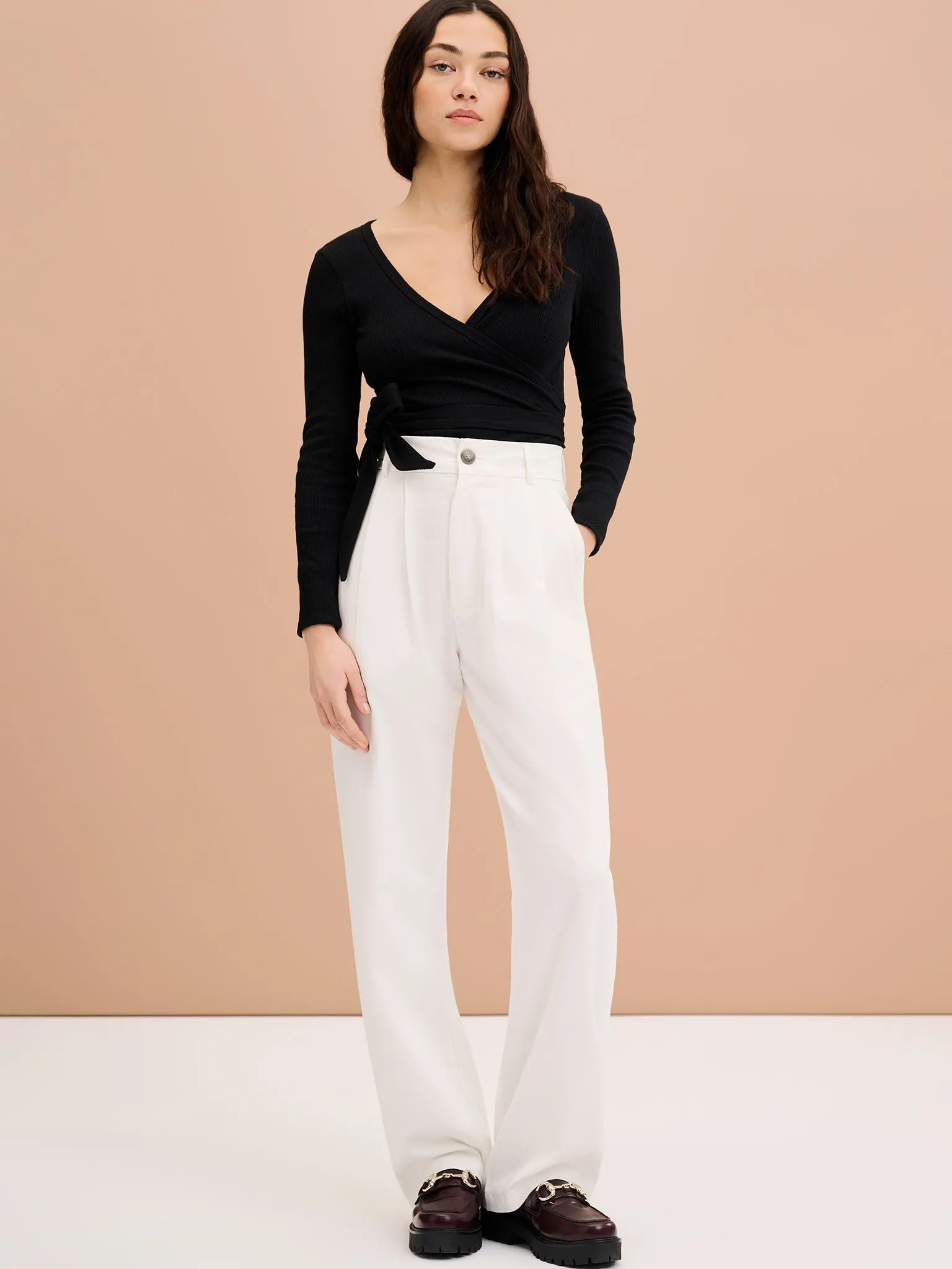 Napeta Ballet Wrap Top in Black sold by Omnes