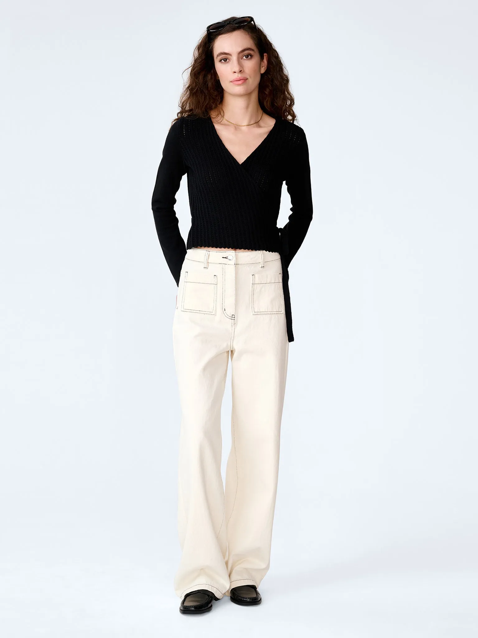 Soleil Knitted Wrap Top in Black sold by Omnes