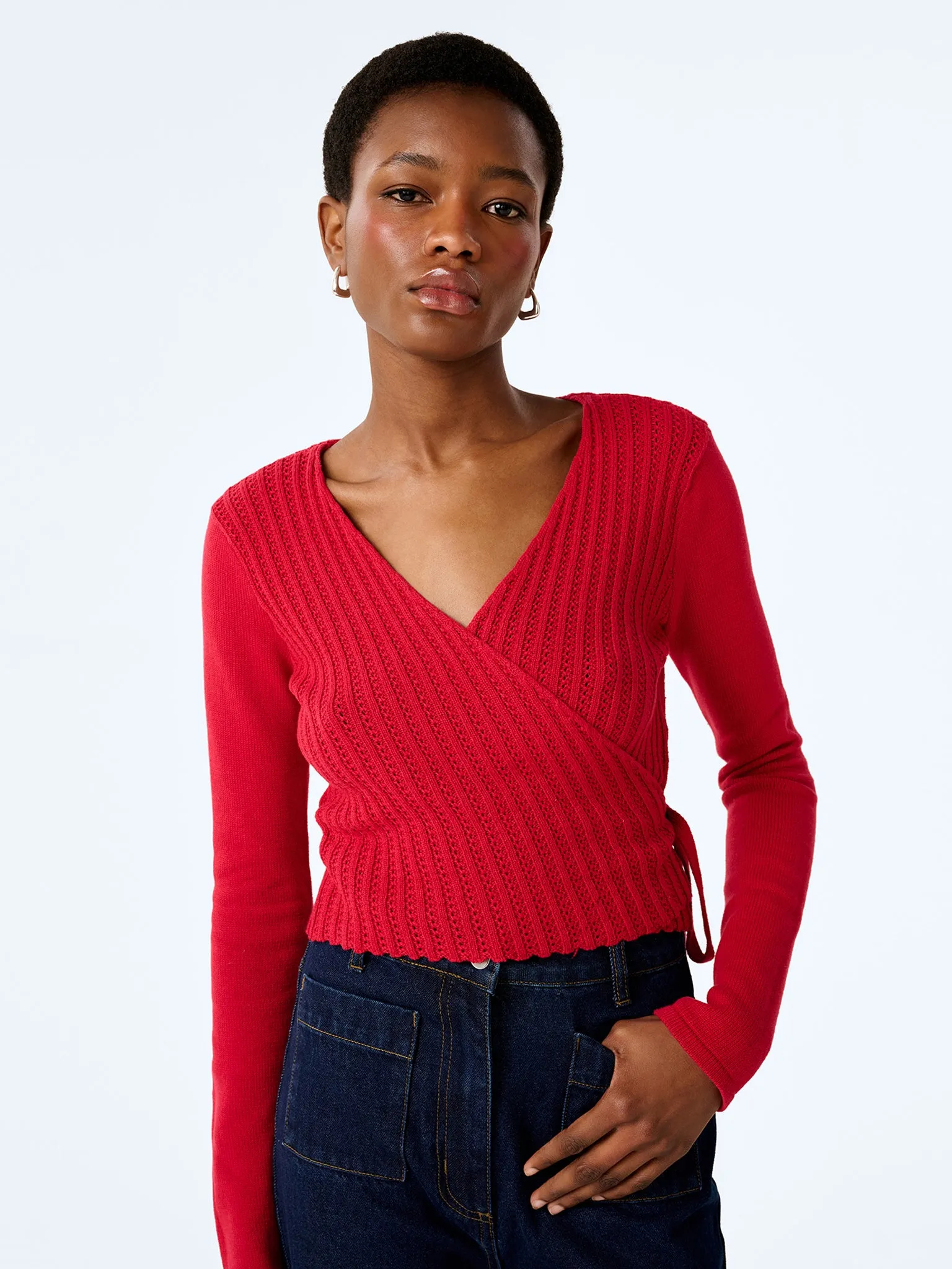 Soleil Knitted Wrap Top in Red sold by Omnes