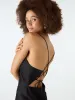 Riviera Mini Dress in Black sold by Omnes