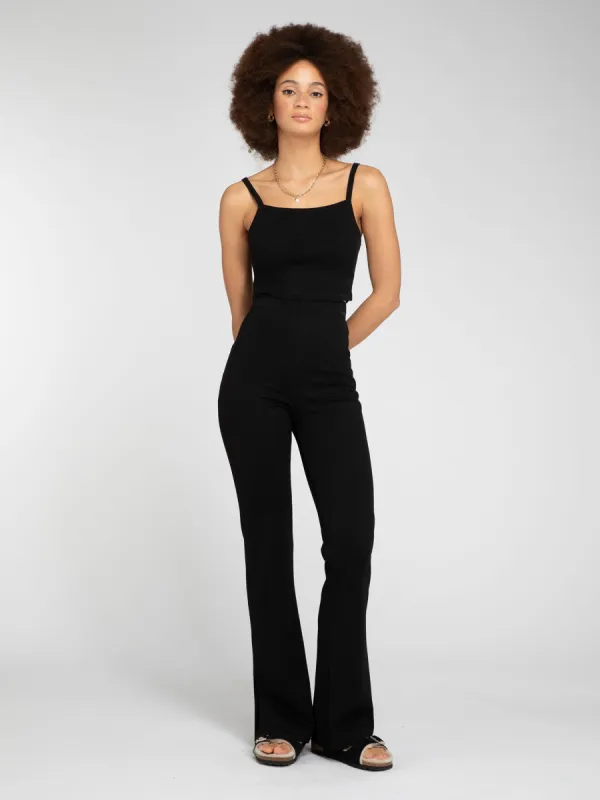Thallo Flare Trousers in Black sold by Omnes