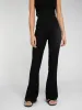 Thallo Flare Trousers in Black sold by Omnes