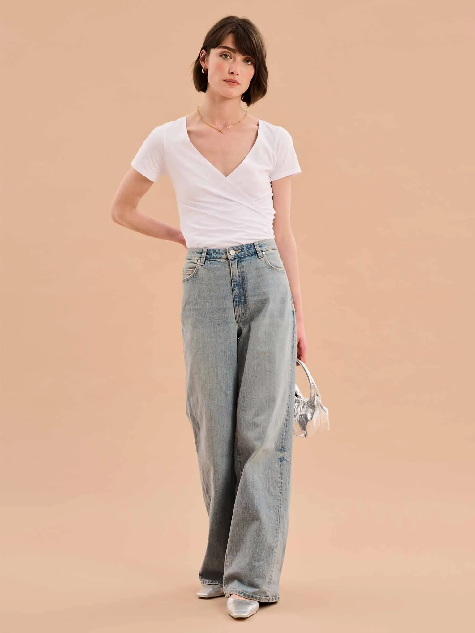 Hilary Jersey Top in White sold by Omnes